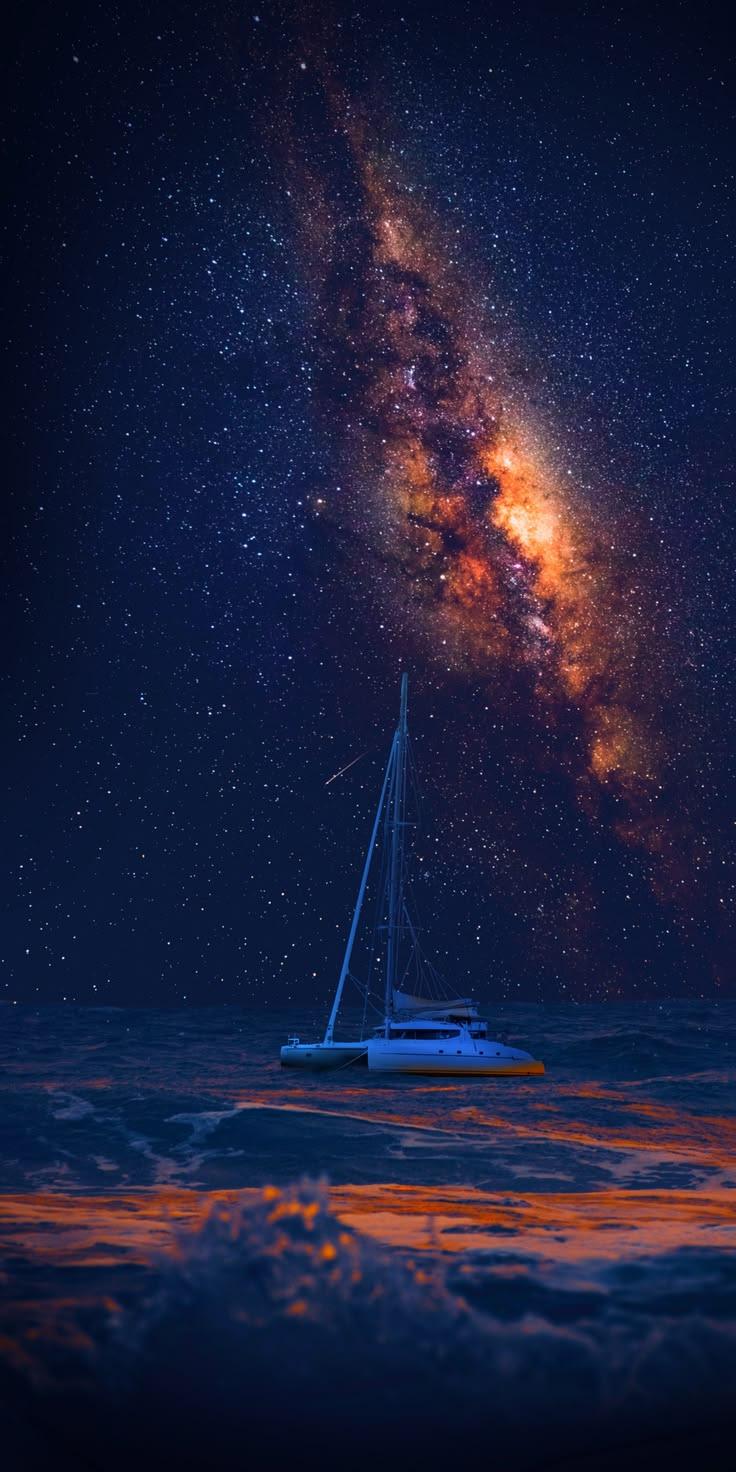 Sailboat and Yacht on Serene Waters Wallpaper