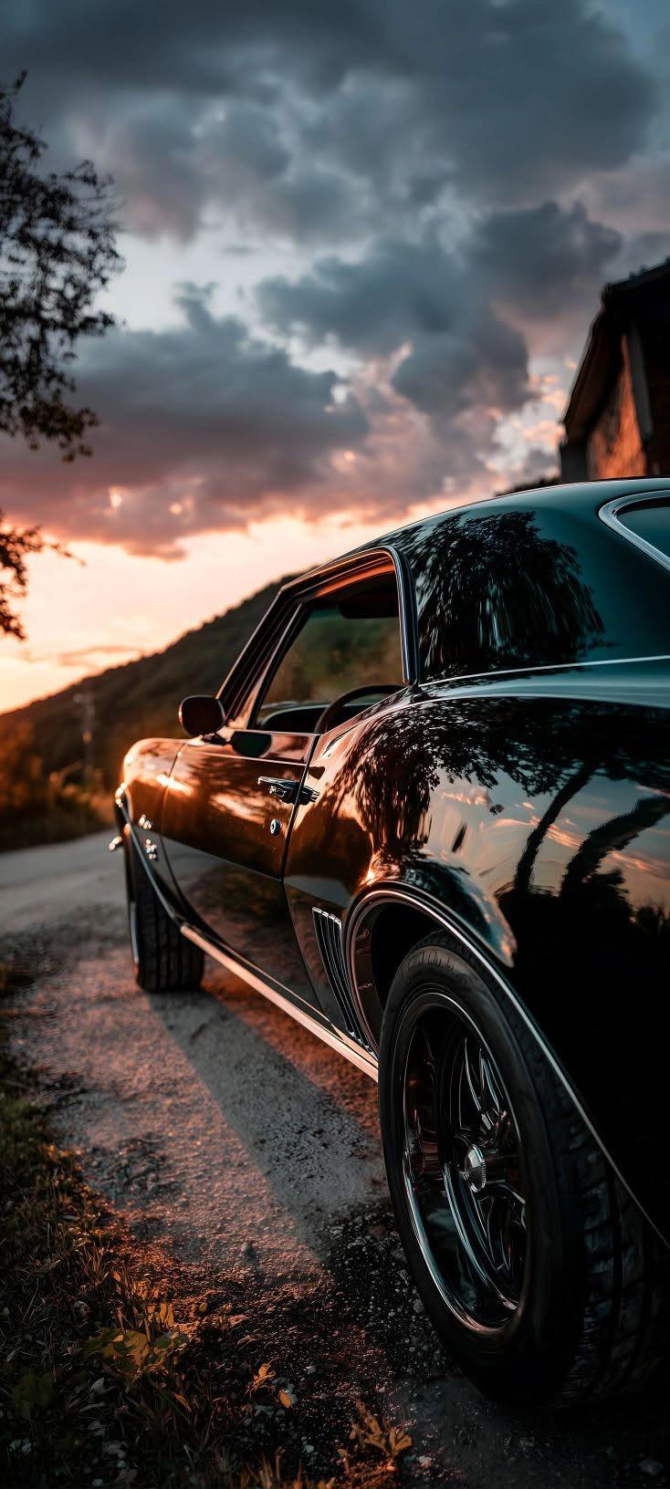 Classic Black Muscle Car Sunset Wallpaper